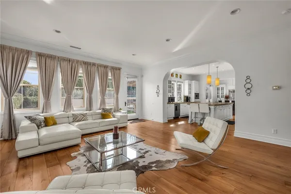 a kitchen with stainless steel appliances granite countertop a stove and a microwave