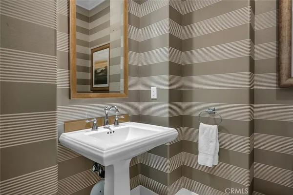 a view of a livingroom with a hall and an entryway