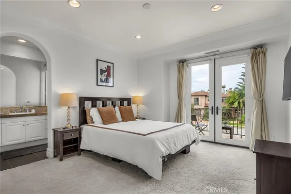 a view of an empty room with a bathroom