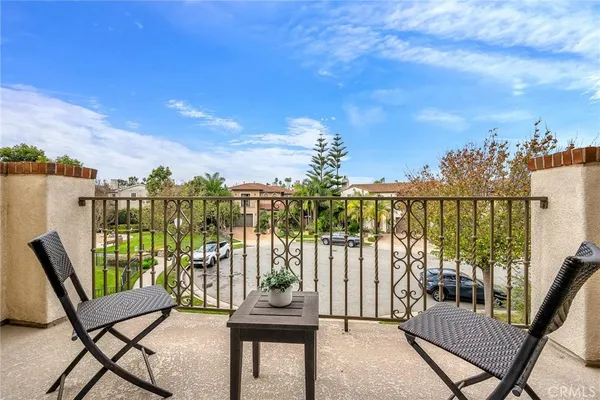 a bathroom with a granite countertop sink toilet a mirror and shower