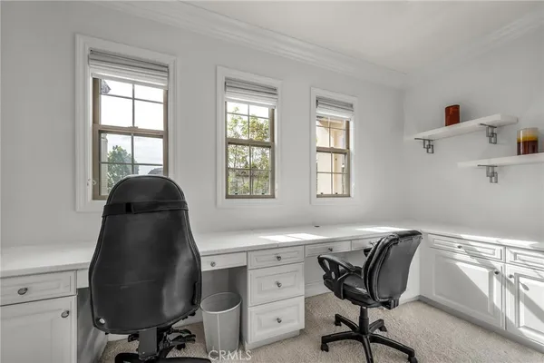 a utility room with cabinets