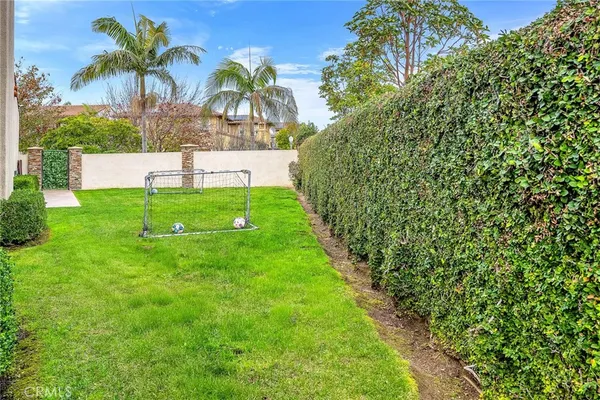 a view of entryway livingroom and hall with wooden floor