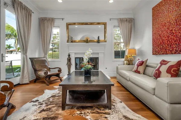 a view of a livingroom with furniture and stairs