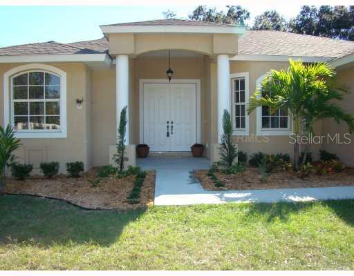 Exterior Front - Brand new custom home never lived in just 9 minutes to downtown.