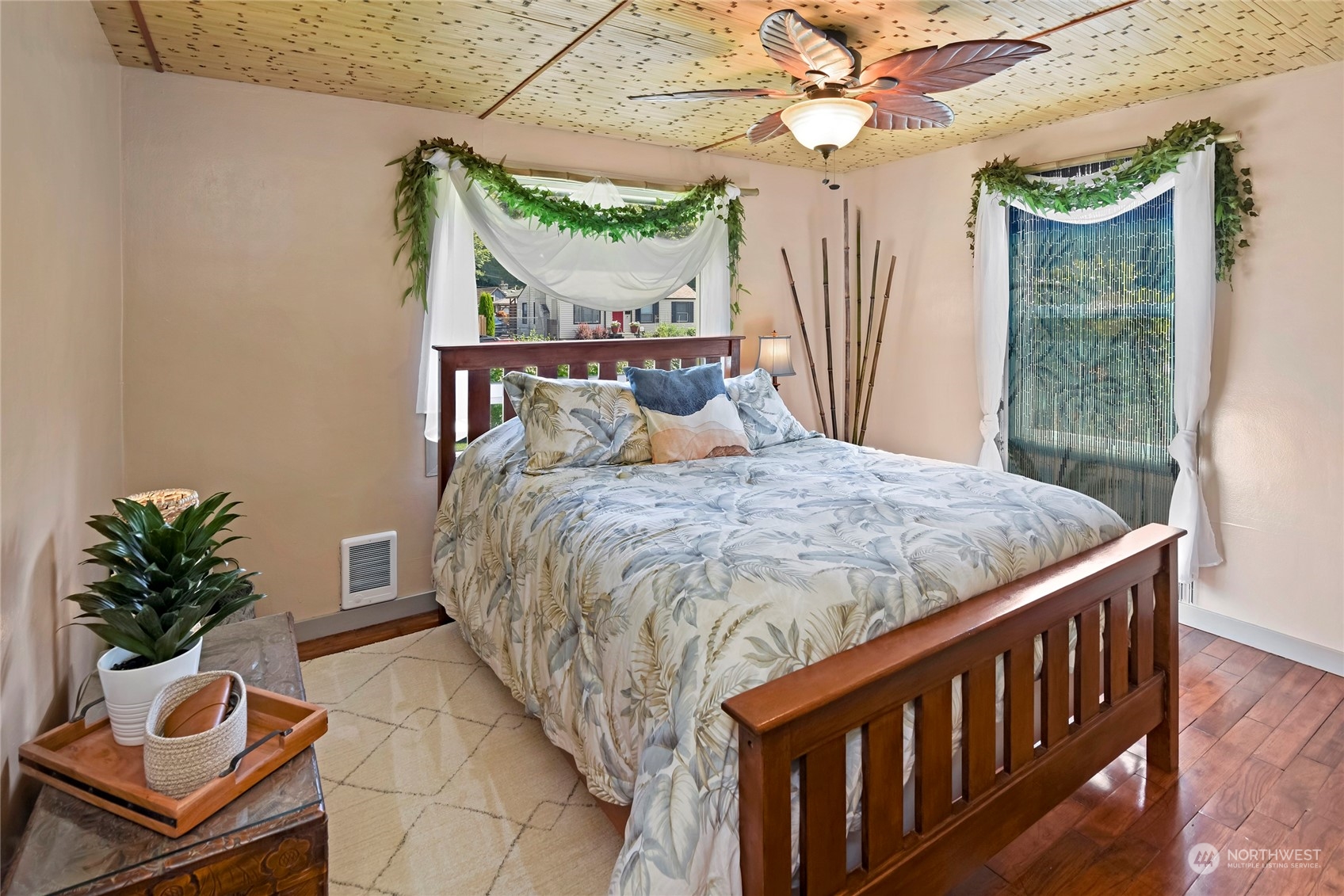 3609 Southeast 5th Place Renton, WA 98058 - Photo 13 of 40 a bed sitting in a bedroom next to a window