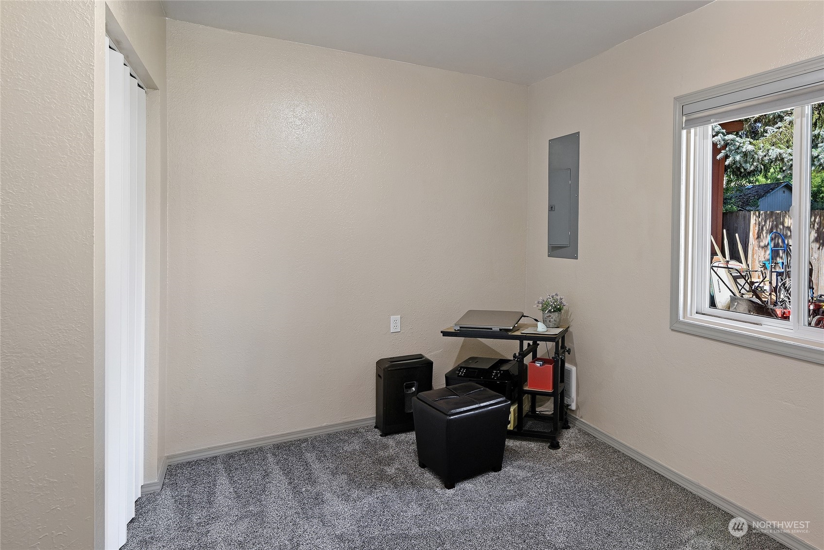 3609 Southeast 5th Place Renton, WA 98058 - Photo 18 of 40 a room with furniture and window