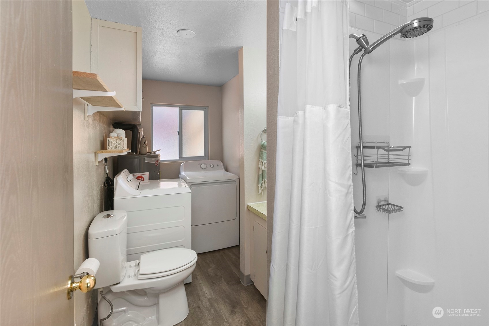3609 Southeast 5th Place Renton, WA 98058 - Photo 19 of 40 a bathroom with a sink toilet and shower