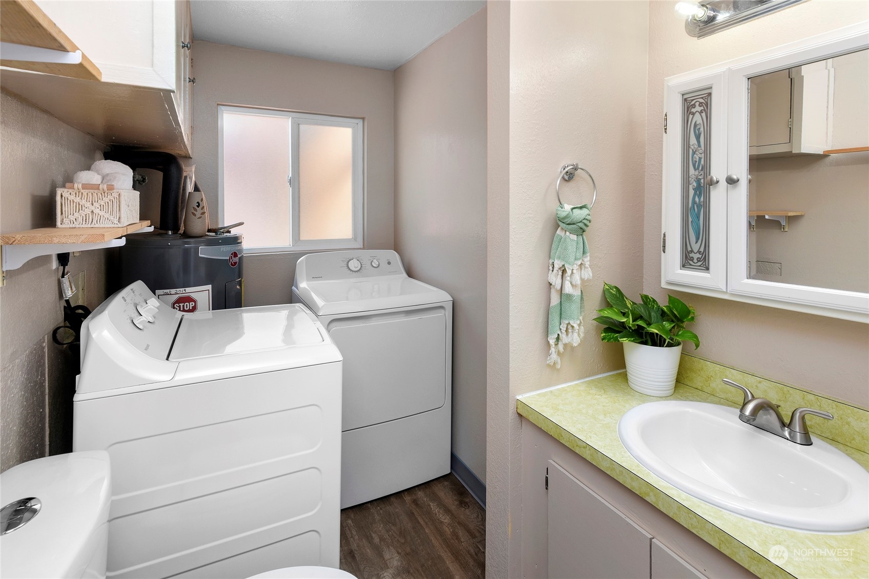 3609 Southeast 5th Place Renton, WA 98058 - Photo 20 of 40 a bathroom with a sink and a mirror