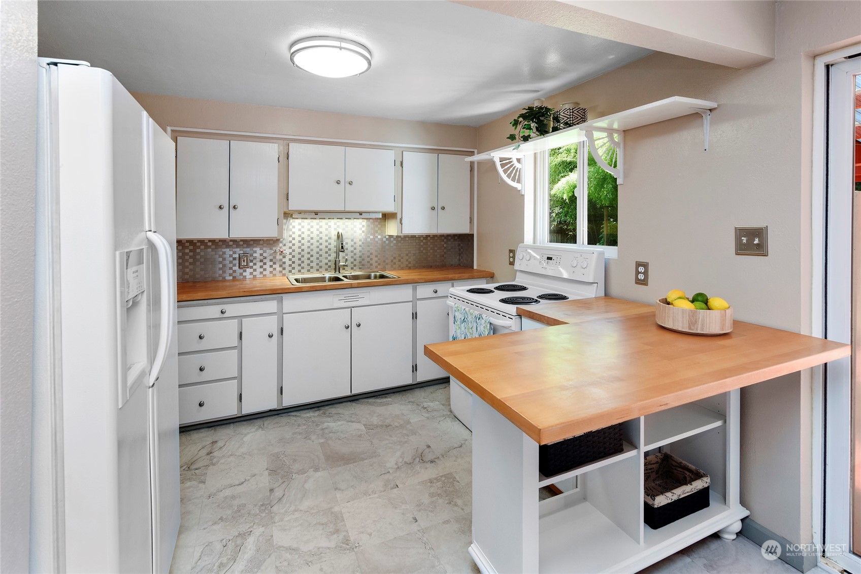 3609 Southeast 5th Place Renton, WA 98058 - Photo 22 of 40 a kitchen with stainless steel appliances cabinets and wooden floor