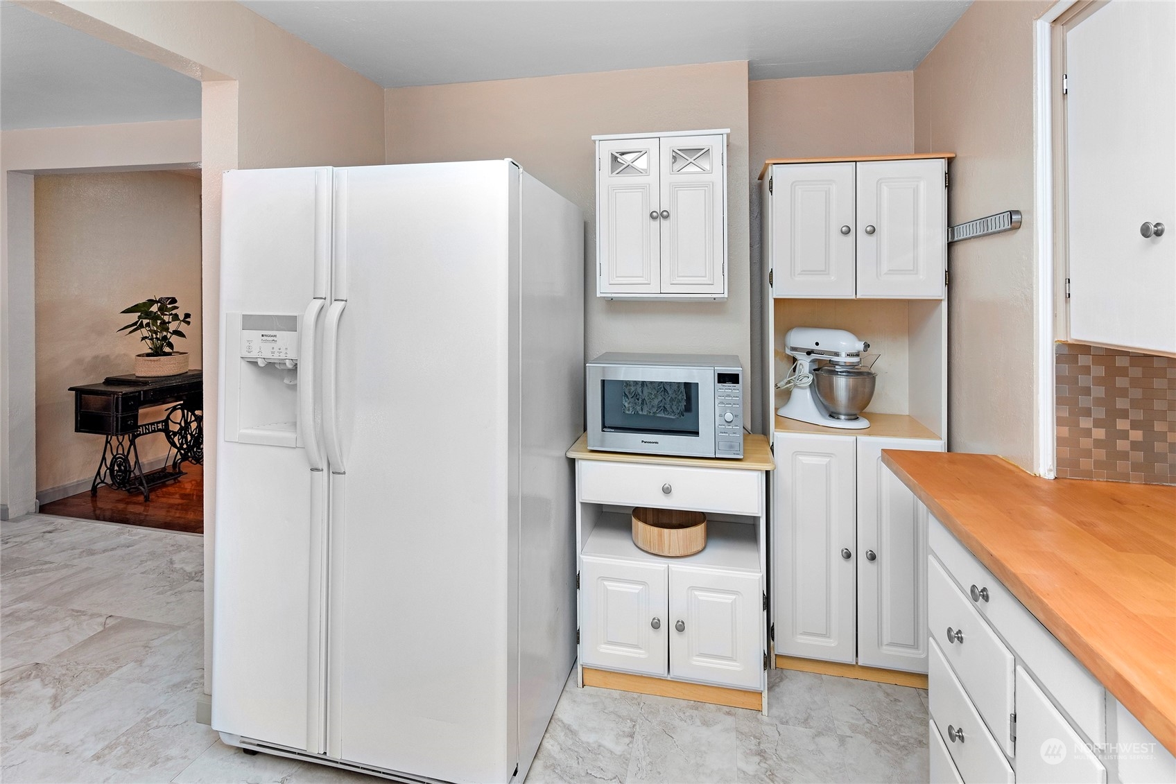 3609 Southeast 5th Place Renton, WA 98058 - Photo 24 of 40 a kitchen with a refrigerator and a sink