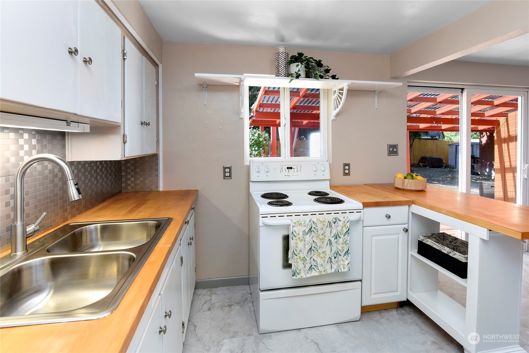 3609 Southeast 5th Place Renton, WA 98058 - Photo 25 of 40 a utility room with dryer washer and a sink