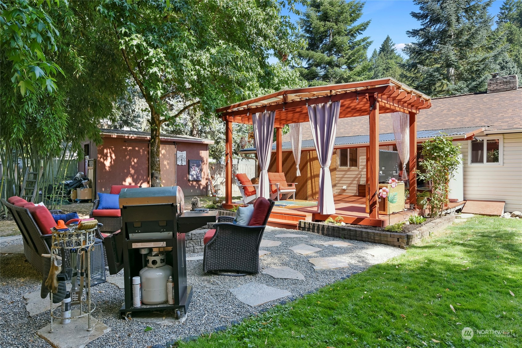 3609 Southeast 5th Place Renton, WA 98058 - Photo 31 of 40 a backyard of a house with yard table and chairs