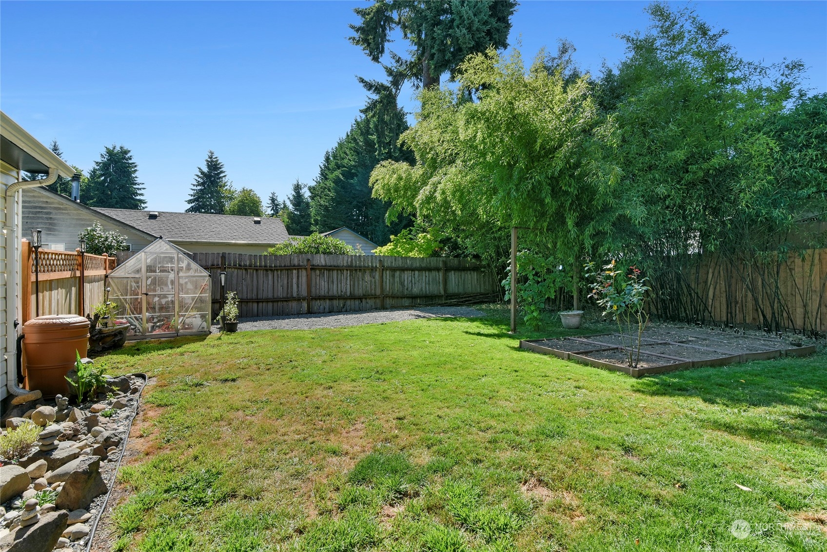 3609 Southeast 5th Place Renton, WA 98058 - Photo 37 of 40 a view of backyard with seating and green space