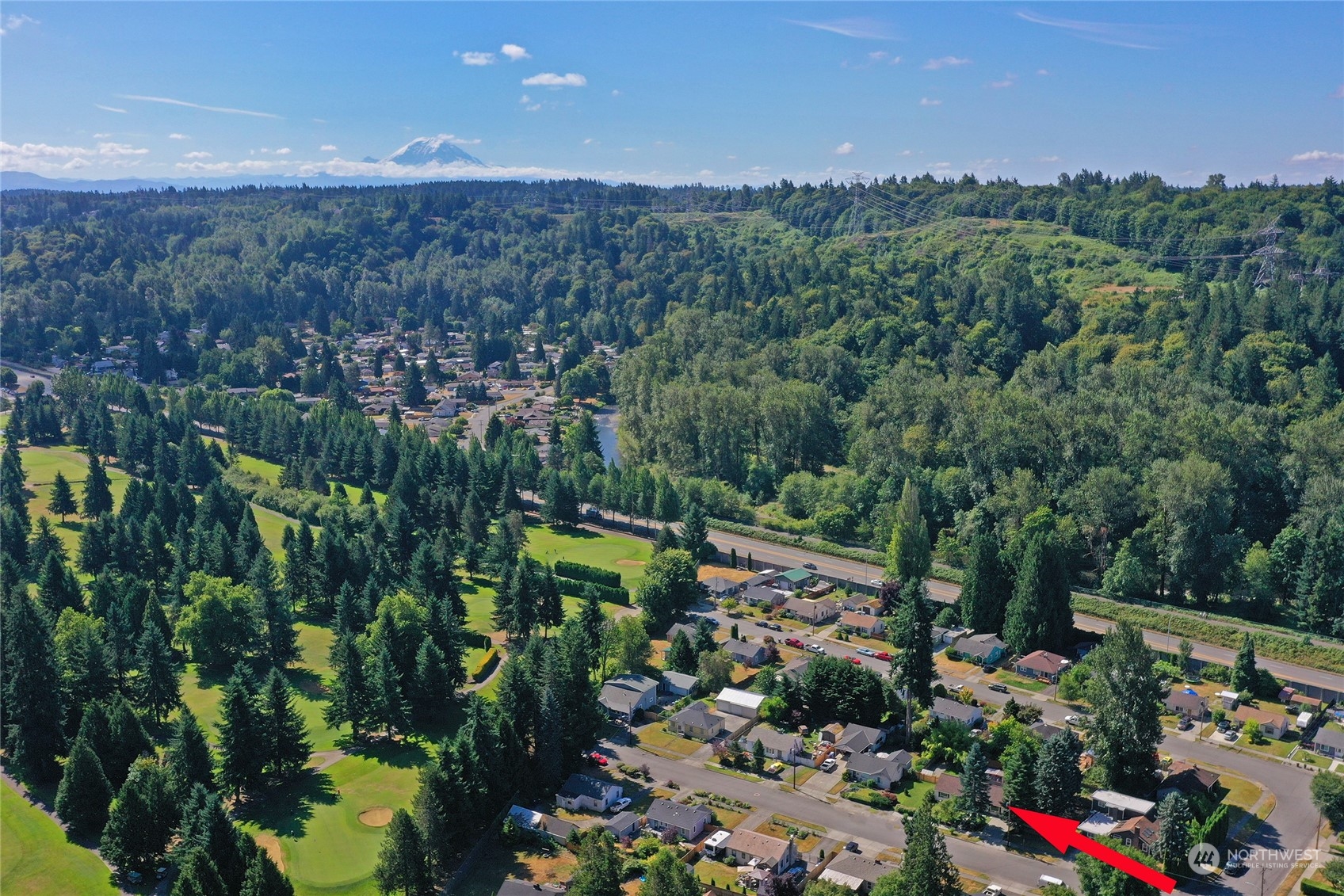 3609 Southeast 5th Place Renton, WA 98058 - Photo 40 of 40 a view of a garden with a building in background