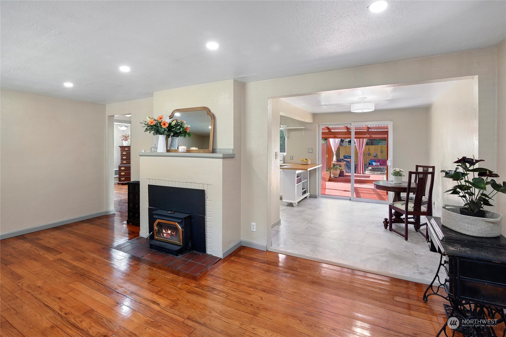 3609 Southeast 5th Place Renton, WA 98058 - Photo 8 of 40 a living room with furniture and a fireplace