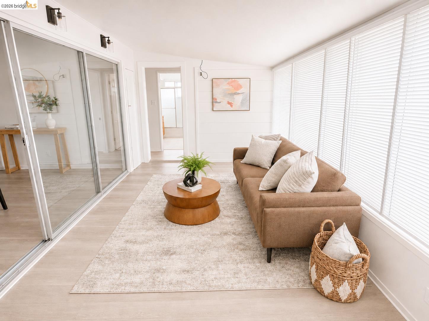 810 Pierce Street Albany, CA 94706 - Photo 18 of 25 Bright sunroom featuring light wood-finish flooring and a white shiplap accent wall