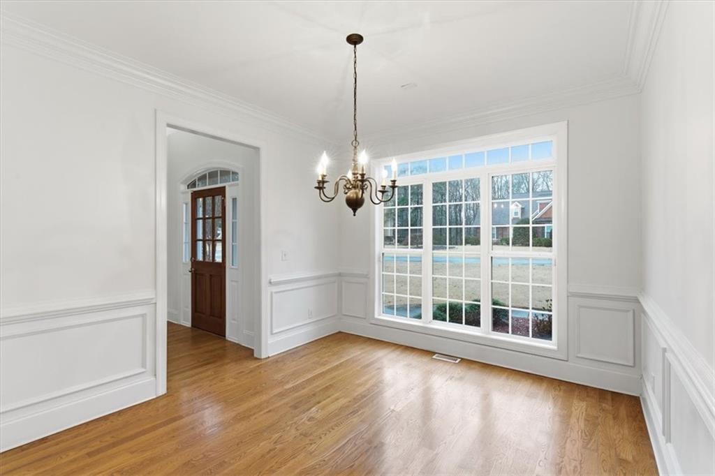 16 Quarter Horse Drive Northwest Rome, GA 30165 - Photo 16 of 51 a view of a room with wooden floor chandelier and windows