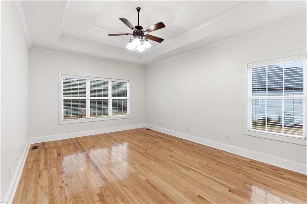 16 Quarter Horse Drive Northwest Rome, GA 30165 - Photo 17 of 51 a view of an empty room with wooden floor and a window