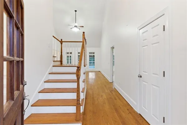 a view of a hallway with front door