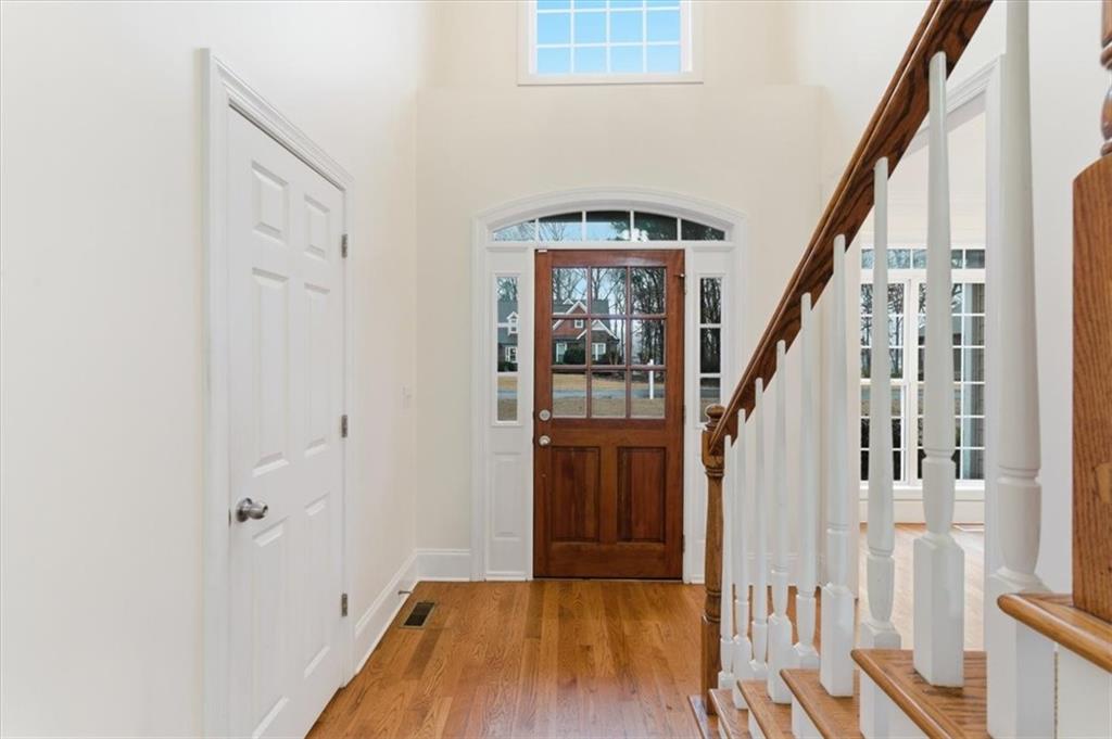 16 Quarter Horse Drive Northwest Rome, GA 30165 - Photo 3 of 51 a view of front door with wooden floor and stairs