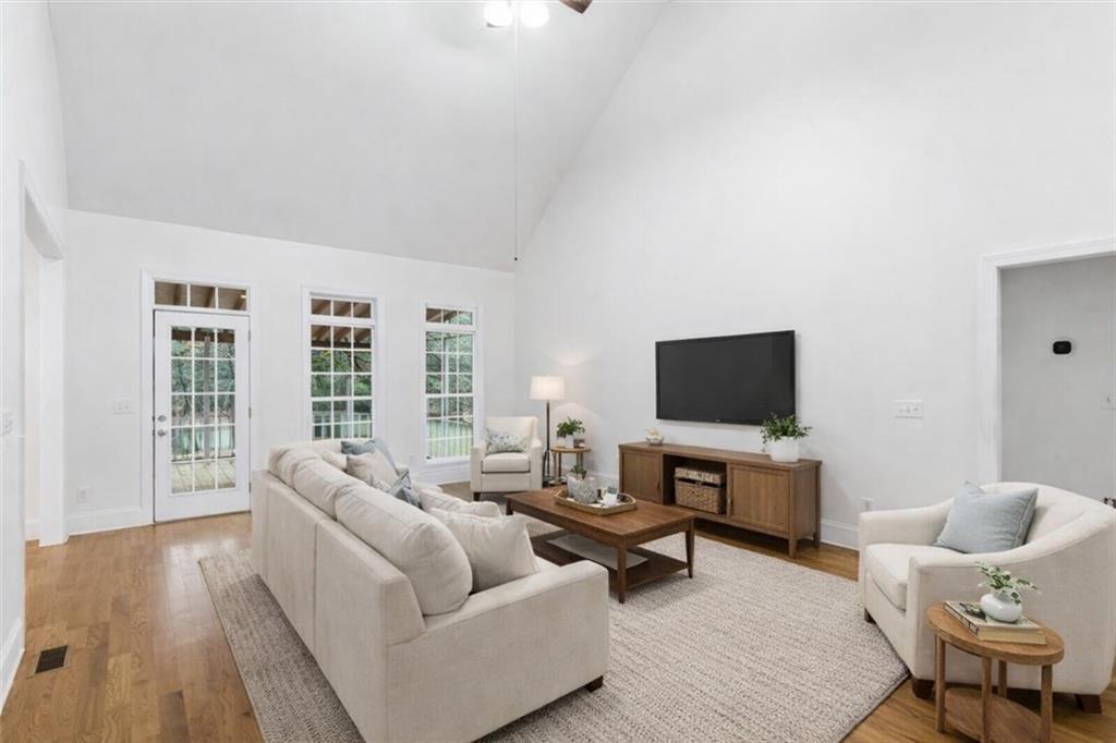 16 Quarter Horse Drive Northwest Rome, GA 30165 - Photo 51 of 51 a living room with furniture and a flat screen tv