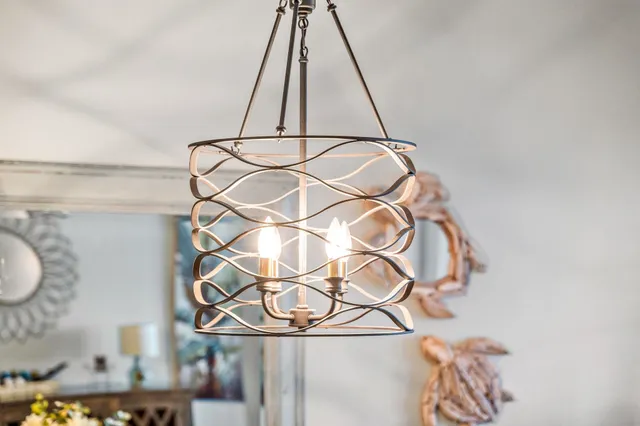 a view of a bedroom with cabinet flat screen tv and windows