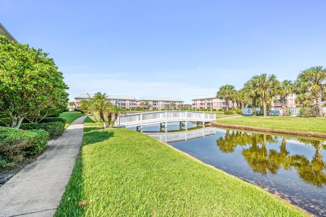 an aerial view of residential building with parking space