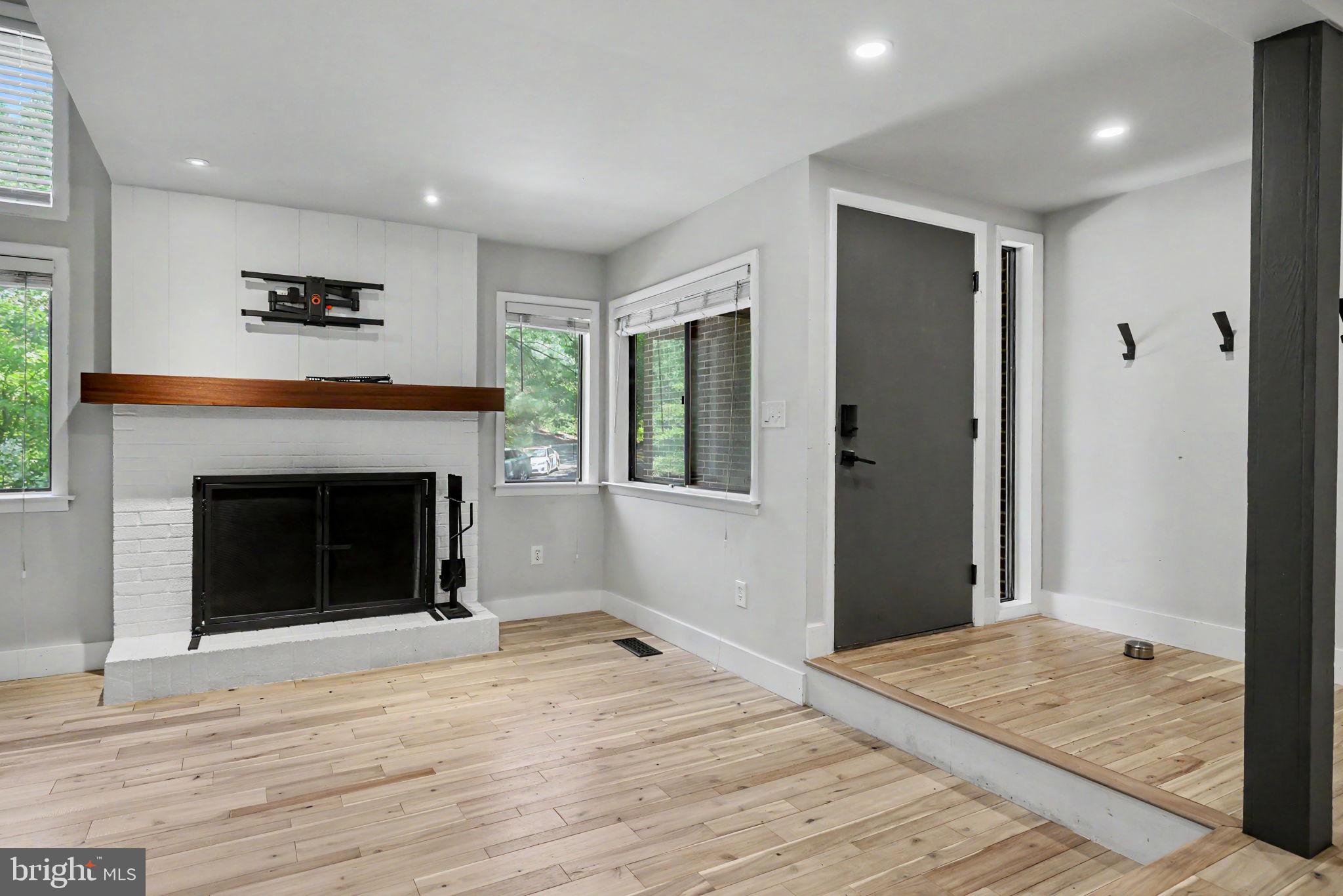 2105 Glencourse Lane Reston, VA 20191 - Photo 4 of 74 Living room view to front door