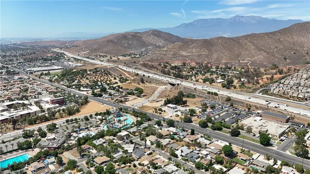 an aerial view of residential houses and covered with snow