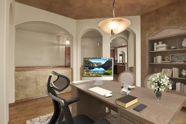 a living room with fireplace furniture and a flat screen tv