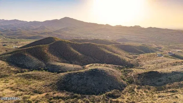 a view of a house with a mountain