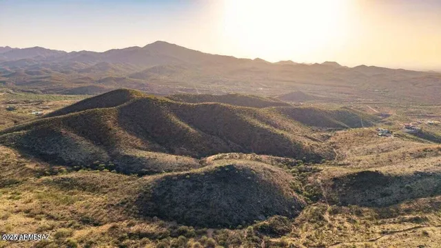 a view of a house with a mountain
