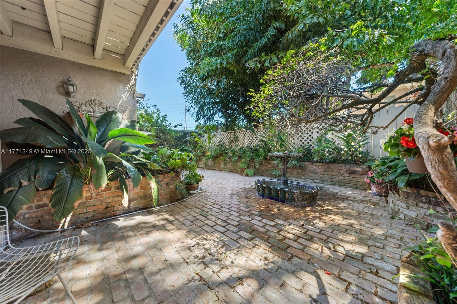206 St Andrews Road, Unit 1878 Hollywood, FL 33021 - Photo 29 of 53 OUTSIDE OF LIVING ROOM AND DINING ROOM OPENS TO THE GRAND PATIO