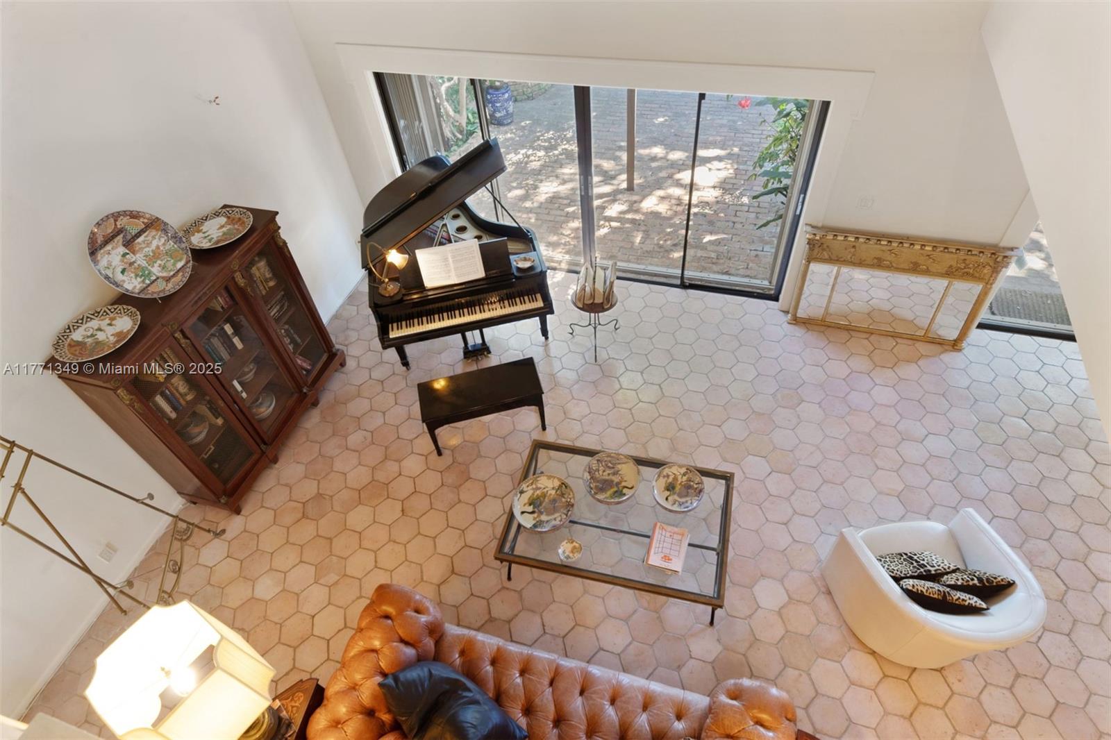 206 St Andrews Road, Unit 1878 Hollywood, FL 33021 - Photo 43 of 53 AERIAL VIEW OF LIVING ROOM FROM TOP OF STAIRS