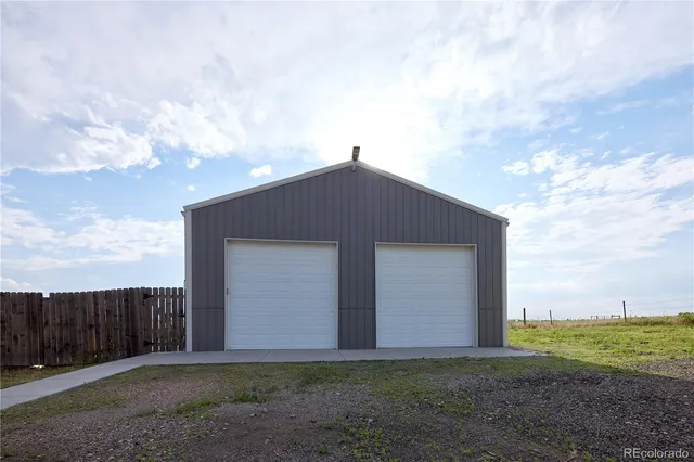 a view of a balcony with chairs