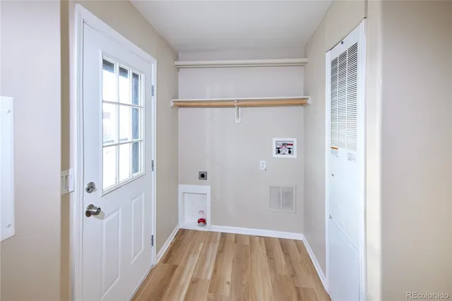 a view of a room that has a window in it