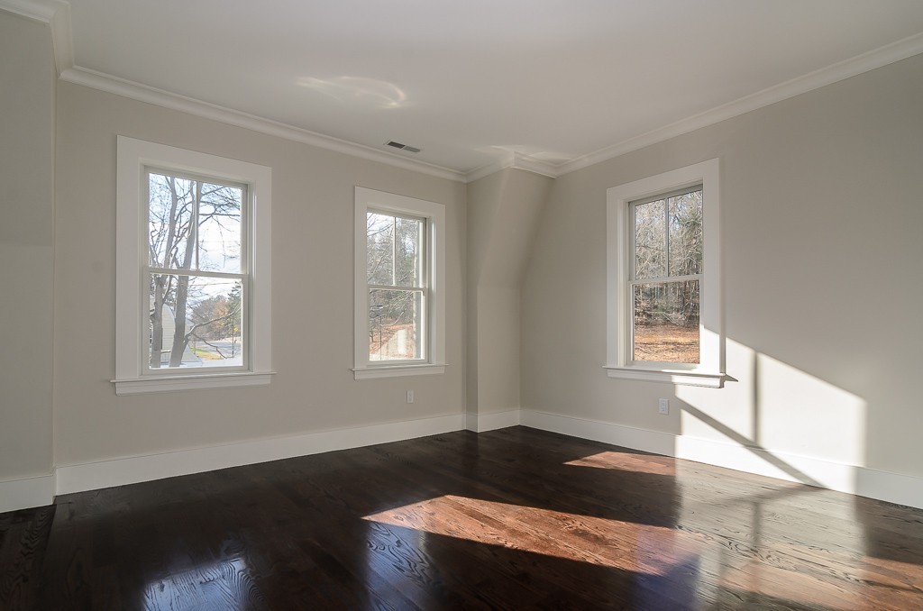 2 Leighton Road Wellesley, MA 02482 - Photo 11 of 16 a living room with wooden floor and a window