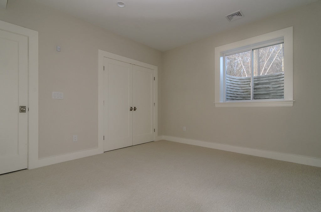 2 Leighton Road Wellesley, MA 02482 - Photo 15 of 16 an empty room with a window