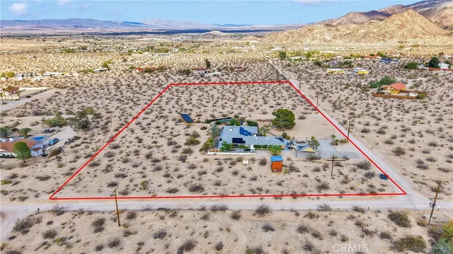 a view of backyard with green space