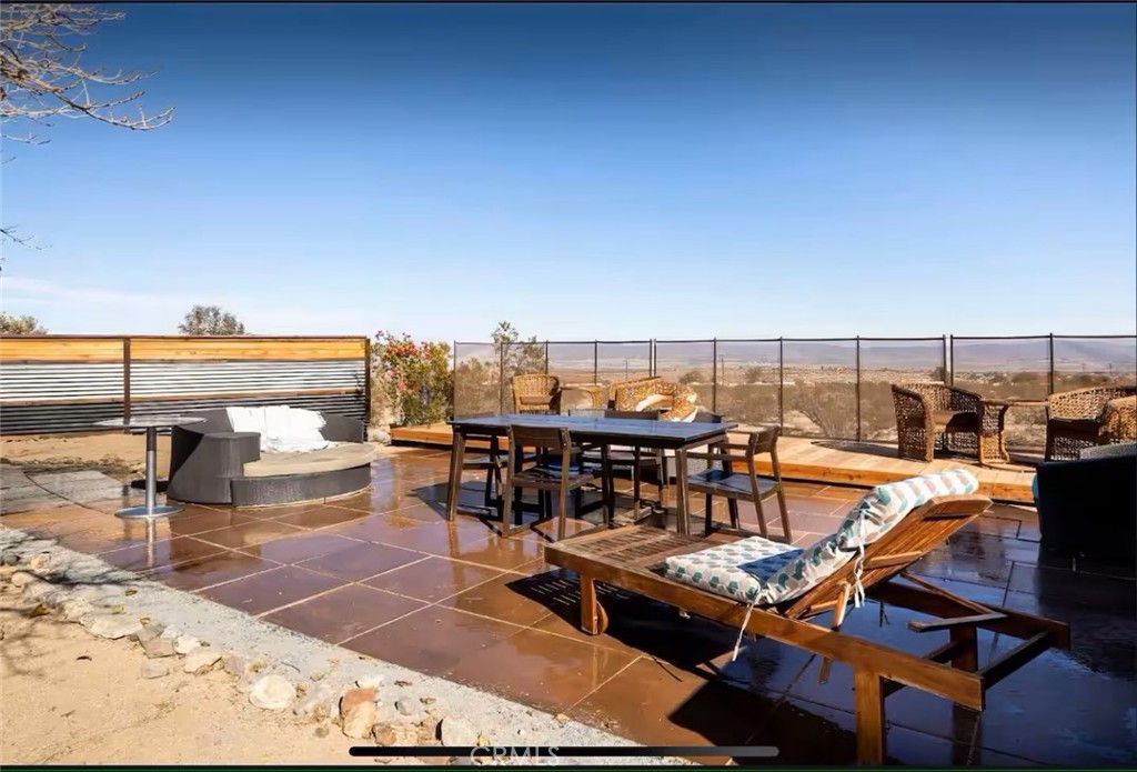 70138 Sullivan Road Twentynine Palms, CA 92277 - Photo 30 of 68 a view of a terrace with chairs