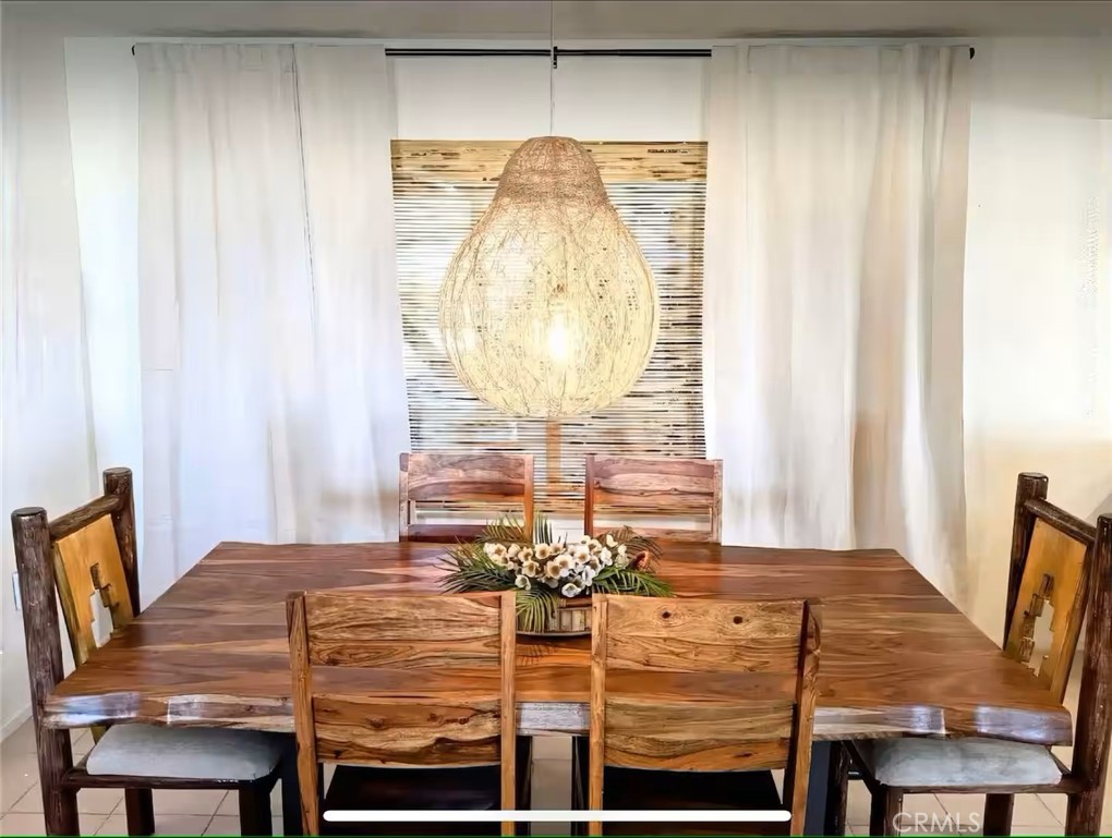 70138 Sullivan Road Twentynine Palms, CA 92277 - Photo 6 of 68 a view of a dining room with furniture and window