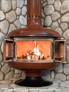 a living room with furniture and large windows