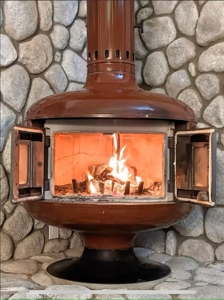70138 Sullivan Road Twentynine Palms, CA 92277 - Photo 8 of 68 a room with furniture and a large window