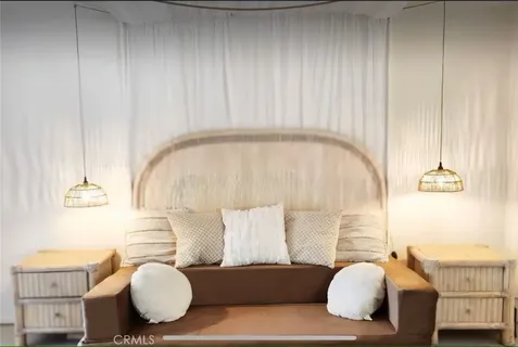 a living room with furniture a couch and a fireplace