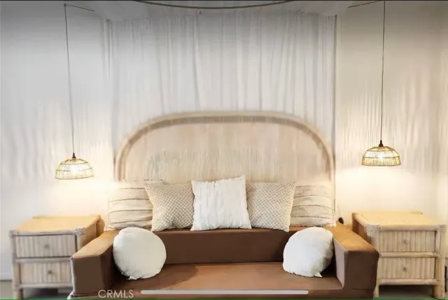 a living room with furniture a couch and a fireplace