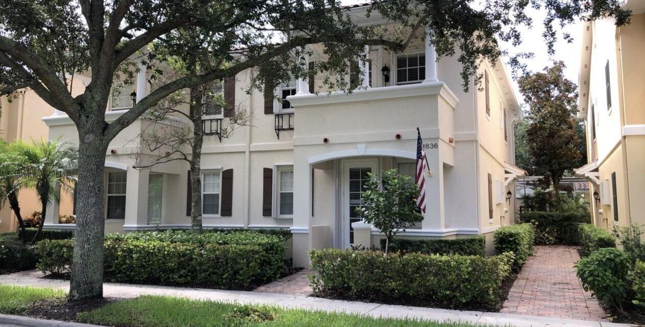 1836 Jeaga Drive Jupiter, FL 33458 - Photo 1 of 20 front view of a house with a garden
