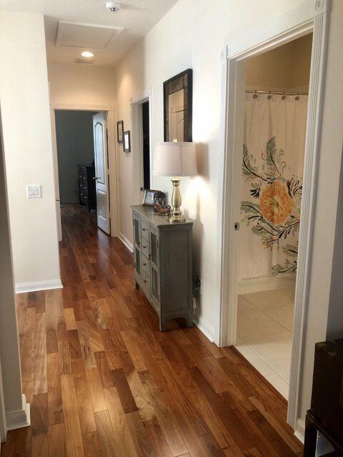 1836 Jeaga Drive Jupiter, FL 33458 - Photo 15 of 20 a view of a living room with wooden floor