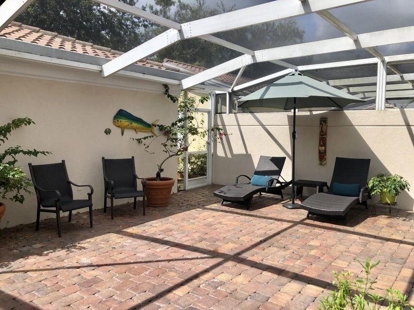1836 Jeaga Drive Jupiter, FL 33458 - Photo 17 of 20 a outdoor space with lots of tables and chairs
