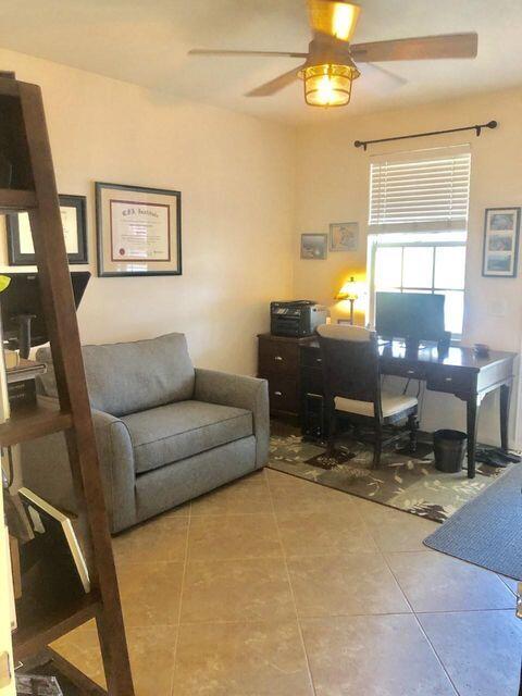 1836 Jeaga Drive Jupiter, FL 33458 - Photo 5 of 20 a living room with furniture