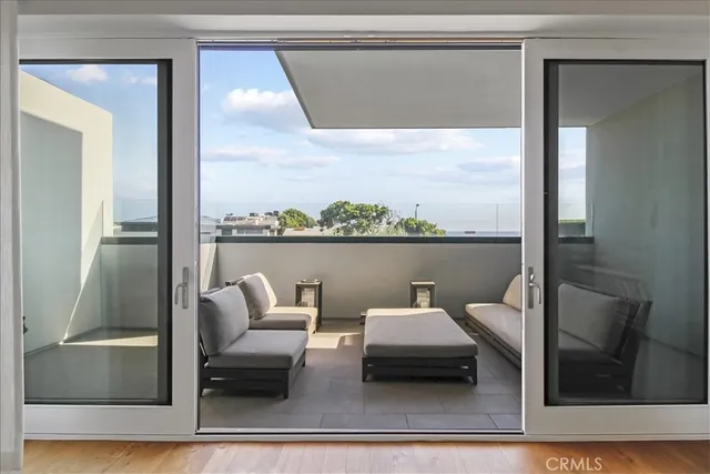 a bathroom with a toilet sink vanity and mirror